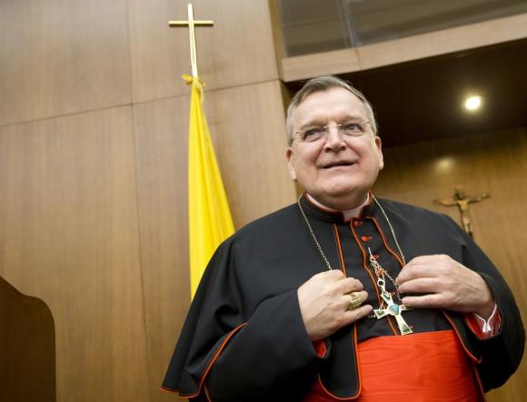 Cardinal Raymond Leo Burke arrives for the presentation of his book Divine Love Made Flesh, in Rome in this Oct. 14, 2015 file photo. The Pacific Daily News reports that Cardinal Raymond Burke is scheduled to interview a former altar boy who says he was sexually abused by Guam Archbishop Anthony Apron. (AP Photo/Andrew Medichini)