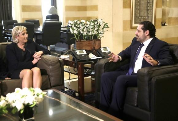 Lebanese prime minister Saad Hariri (R) meets with French National Front leader and presidential candidate Marine Le Pen, left, at the government palace, in Beirut, Lebanon on Feb. 20, 2017. Le Pen has arrived in Beirut to meet with the Lebanese head of state and leading Christian figures. (AP Photo/Hussein Malla)