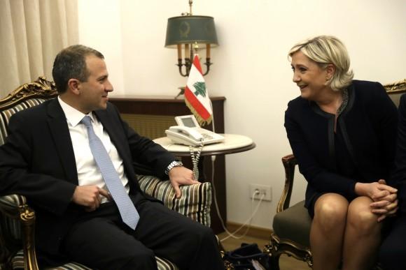 Lebanese Foreign Minister Gibran Bassil (L) meets with conservative French leader and presidential candidate Marine Le Pen (R) in Beirut, Lebanon on Feb. 20, 2017. The National Front leader is hoping to burnish her credentials as a defender of Christians in the Middle East, ahead of France's April 23 presidential elections. (AP Photo/Hussein Malla)