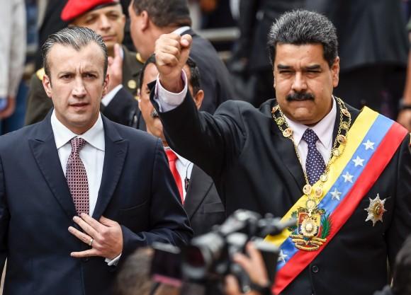Venezuelan President Nicolas Maduro (R) and Vice President Tareck El Aissami greet supporters before the ceremony where Maduro gave a speech reviewing his year in office at the Supreme Court of Justice in Caracas on Jan. 15, 2017.<br/>(JUAN BARRETO/AFP/Getty Images)