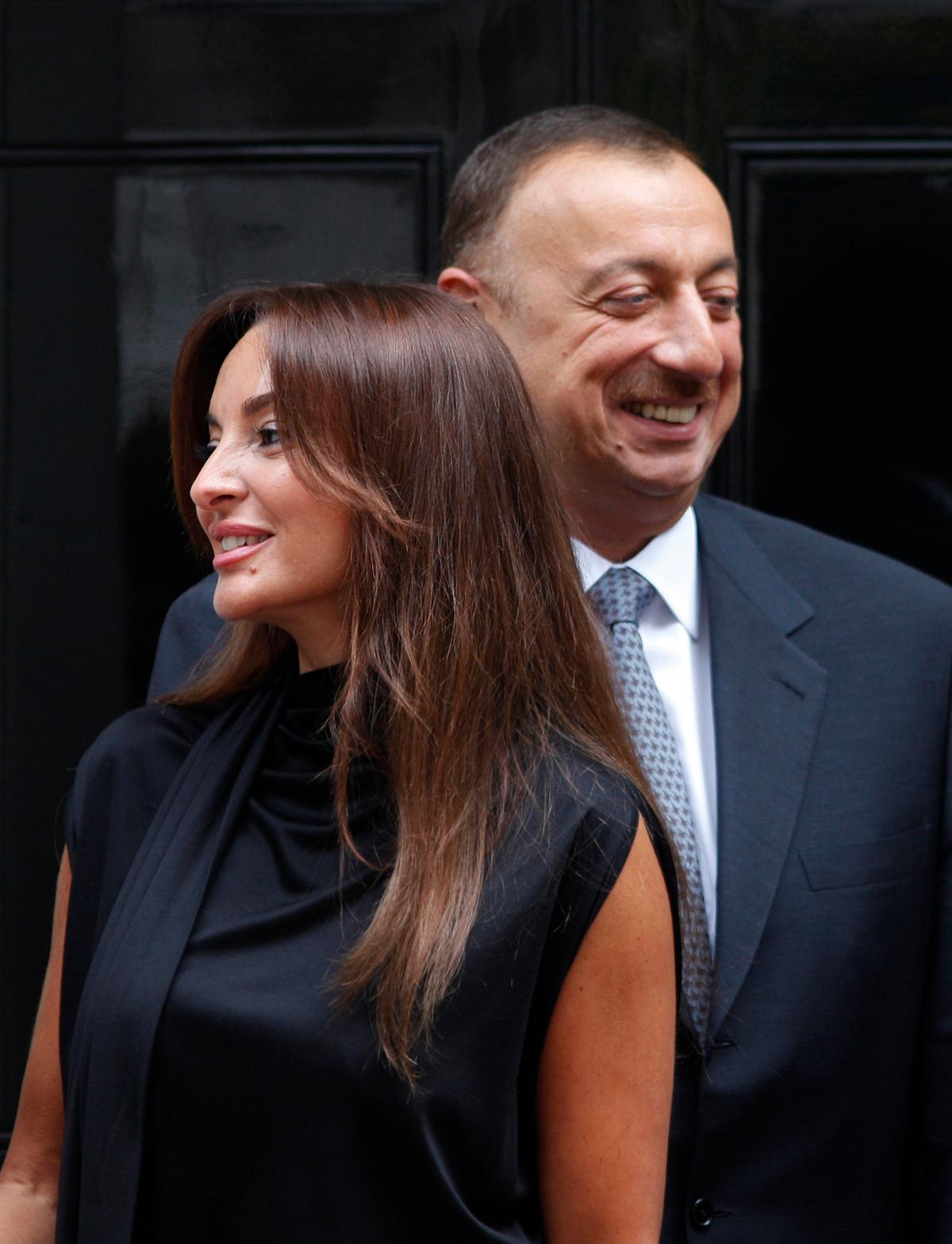 Azerbaijan's President Ilham Aliyev and his wife Mehriban Aliyeva outside the official residence at 10 Downing Street in central London on July 13, 2009. (AP Photo/Lefteris Pitarakis)