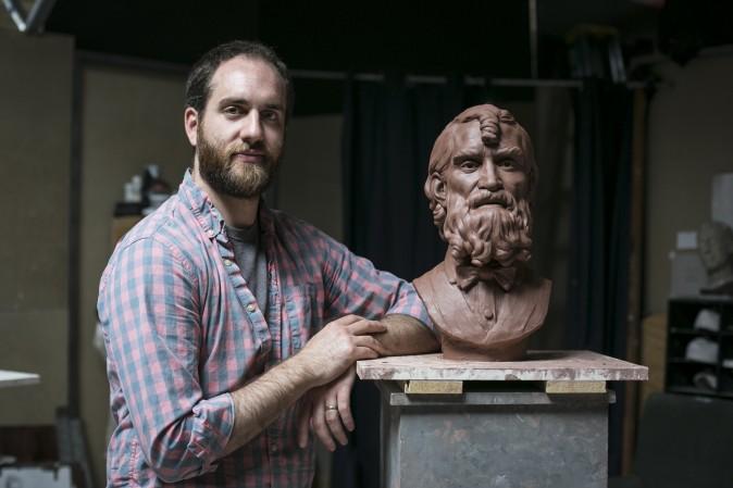 Artist Brendan Johnston next to his sculpture (in progress) at Grand Central Atelier, where he also teaches, in Long Island City, New York on March 25, 2016. (Samira Bouaou/Epoch Times)