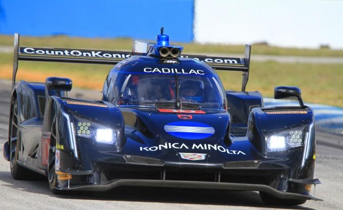 Ricky Taylor in the #10 WTR Cadillac DPi rounds Turn Ten. Brother Jordan scored the quickest lap of the third session. (Chris Jasurek/Epoch Times)