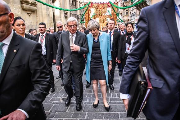 European Commission President Jean-Claude Juncker and British Prime Minister Theresa May in Valletta, Malta, on Feb. 3. The United Kingdom can enter formal negotiations to exit the European Union once the U.K.'s House of Lords passes a Brexit bill currently under review. (Leon Neal/Getty Images)