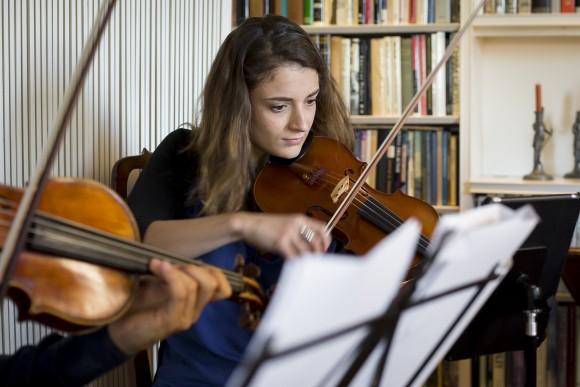 Violist Milena Pajaro-van de Stadt fills in as second violinist during a Manhattan Chamber Players rehearsal. (Samira Bouaou/Epoch Times)