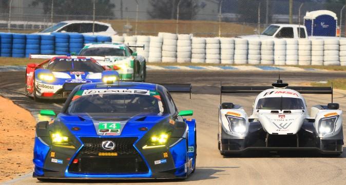 Multi-class racing—here, a pair of GTDs, a GTLM and a prototype—is the hallmark of sportscar endurance racing. Balancing each class, and all cars within each class, is tremendously difficult but also tremendously important. (Chris Jasurek/Epoch Times)