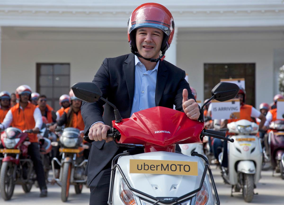 Uber CEO Travis Kalanick, during the launch of its bike-sharing product, uberMOTO, in Hyderabad, India on Dec. 13, 2016. (AP Photo/Mahesh Kumar A., File)