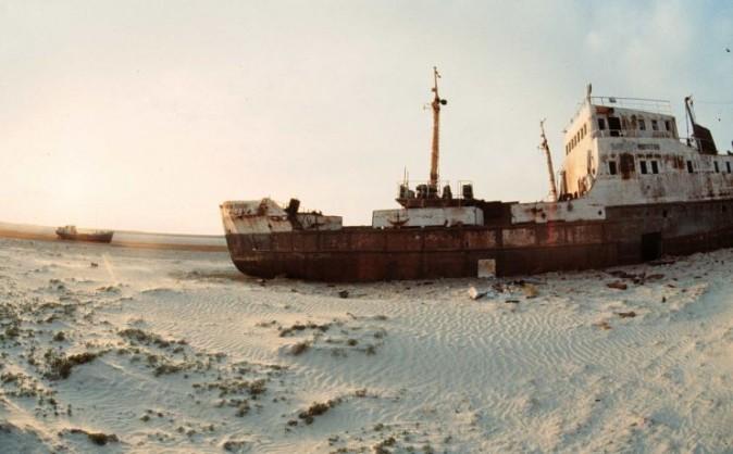 An undated file photo shows abandoned ships sitting on the sand, where the Aral sea retreated, near the Kazakh city of Aralsk. (AFP/VICTOR VASENIN/Getty Images)