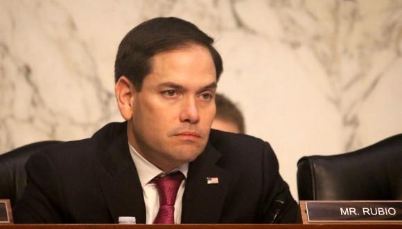 Chairman of the Congressional-Executive Commission on China Marco Rubio listens to testimony at a hearing, titled, "The Broken Promises of China's WTO Accession: Reprioritizing Human Rights," on March 1. (Gary Feuerberg/ Epoch Times)