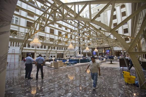 The main lobby of the Trump International Hotel in downtown Washington on Sept. 12, 2016. Trump's $200 million hotel inside the federally owned Old Post Office building has become the place to see, be seen, drink, network, even live, for the still-emerging Trump set. (AP Photo/Pablo Martinez Monsivais, File)