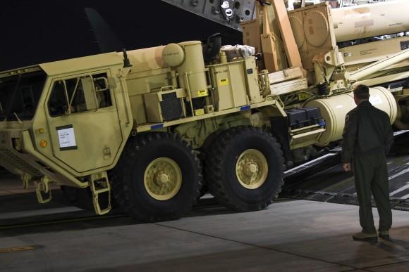 A truck carrying parts of U.S. missile launchers and other equipment needed to set up the Terminal High Altitude Area Defense (THAAD) missile defense system arrive at Osan air base in Pyeongtaek, South Korea on March 6, 2017. The U.S. military has begun moving equipment for the controversial missile defense system to ally South Korea. (U.S. Force Korea via AP)