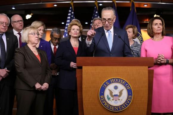 Senate Minority Leader Chuck Schumer (D-N.Y.) and fellow Democrats from both the House and Senate, including House Minority Leader Nancy Pelosi (D-Calif.) (R), at the U.S. Capitol on Jan. 4, 2017. (Chip Somodevilla/Getty Images)