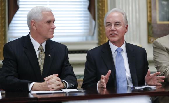 Vice President Mike Pence listens at left as Health and Human Services Secretary Tom Price speaks during a meeting with conservative groups to discuss healthcare on March 10, 2017, in the Indian Treaty Room of the Eisenhower Executive Office on the White House complex in Washington. (AP Photo/Pablo Martinez Monsivais)