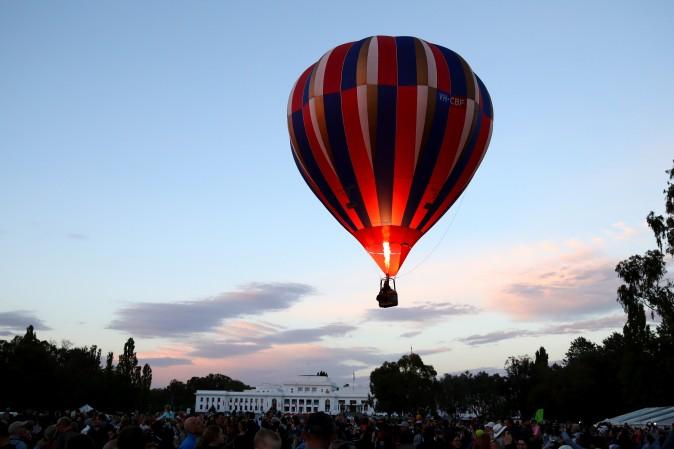 A hot air balloon launches at the 2017 Canberra Balloon Spectacular in Canberra, Australia, on March 12. The Canberra Balloon Spectacular runs over nine days and is considered to be one of the best and longest running hot air ballooning events in the world. (Cameron Spencer/Getty Images)