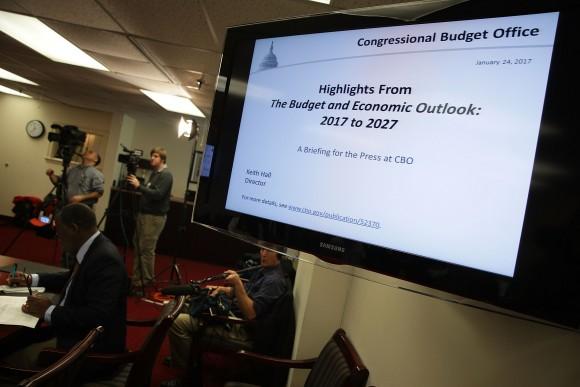 Members of the press cover a Congressional Budget Office (CBO) media briefing in Washington on Jan. 24, 2017. The Congressional Budget Office held a media briefing on the annual Budget and Economic Outlook report. (Alex Wong/Getty Images)