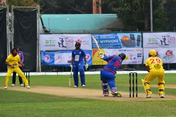 Dwayne Smith of Kowloon Cantons hits straigh during the final of the T20 Blitz against City Kaitak in Hong Kong on Sunday March 12, 2017. Openers Smith and Babar Hayat put on 149 for the 1st wicket in the match. (Bill Cox/Epoch Times)