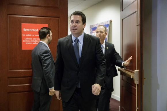 House Intelligence Committee Chairman Rep. Daevin Nunes, R-Calif. (L) followed by the committee's ranking member, Rep. Adam Schiff, D-Calif., arrive for a news conference on Capitol Hill in Washington on March, 15, 2017. (AP Photo/J. Scott Applewhite)