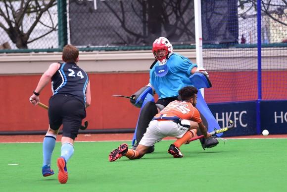 A pass across goal was just missed by Khalsa's Sukhjeet in the match between HKFC and Khalsa on Sunday March 12,2017. (Bill Cox/Epoch Times)