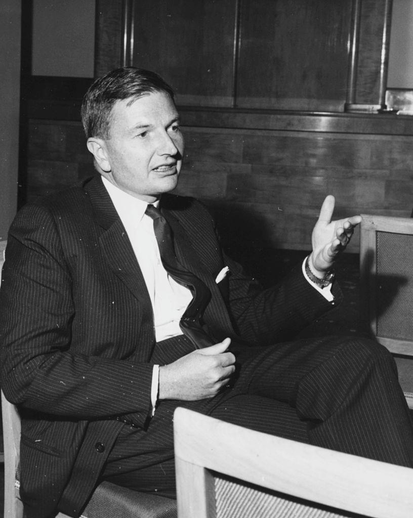 Banker David Rockefeller, Chairman of the Chase Manhattan Corporation, pictured in conversation at the Savoy Hotel during the Chase Investment Forum, London on Oct. 21,1963. (Photo by Moore/Fox Photos/Getty Images)