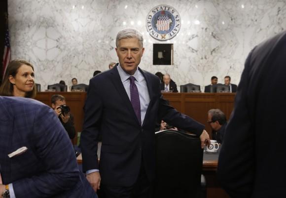 U.S. Supreme Court nominee judge Neil Gorsuch returns from a break in his testimony at his Senate Judiciary Committee confirmation hearing on Capitol Hill in Washington March 21, 2017. (REUTERS/Jonathan Ernst)