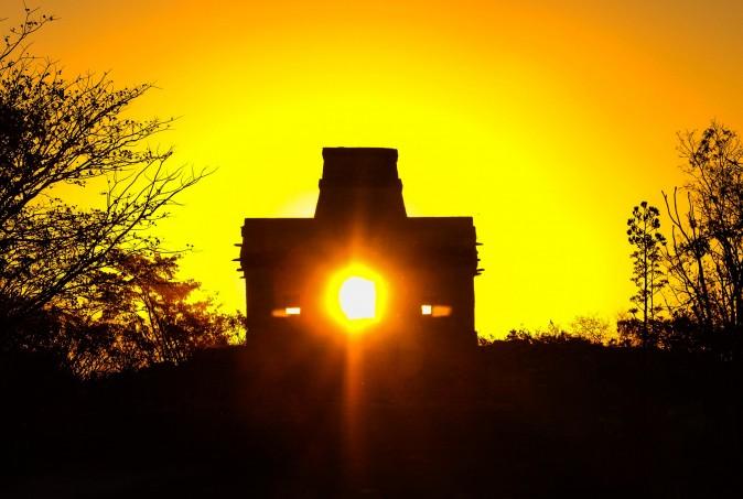The sun rises through the door of the Seven Dolls Temple, which happens only once a year on the day of the spring equinox, in the Maya Ruins of Dzibilchaltun, in the Mexican state of Yucatan on March 20. (ELIZABETH RUIZ/AFP/Getty Images)