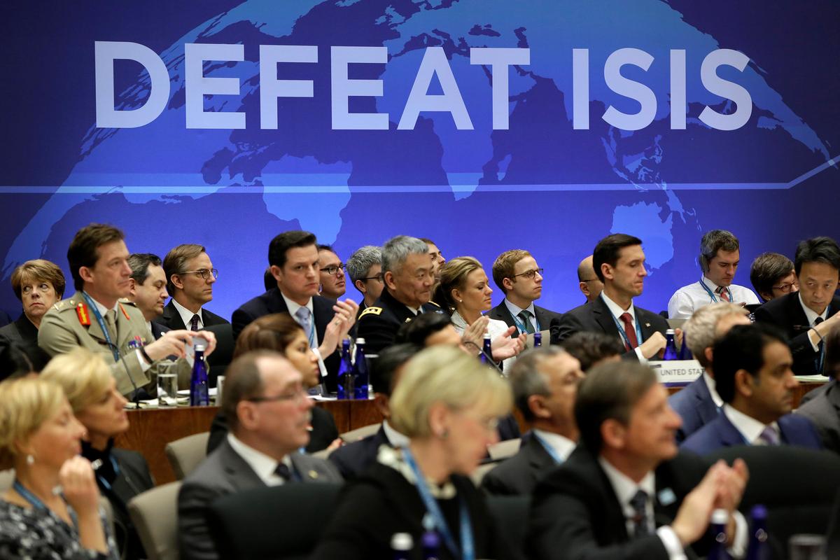 Delegates applaud after remarks at the morning ministerial plenary for the Global Coalition working to Defeat ISIS at the State Department in Washington, U.S. on March 22, 2017. (REUTERS/Joshua Roberts)