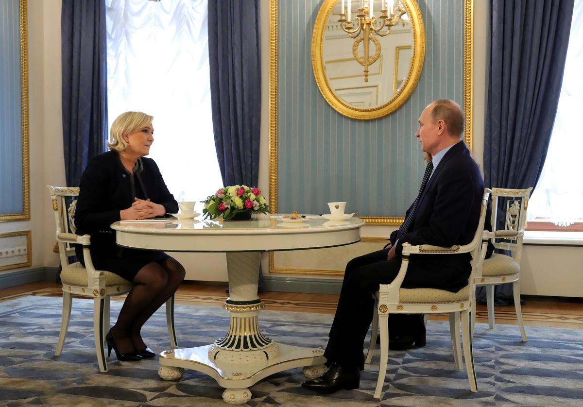 Russian President Vladimir Putin meets with Marine Le Pen, French National Front (FN) political party leader and candidate for the French 2017 presidential election, in Moscow in Russia on March 24, 2017. (Sputnik/Mikhail Klimentyev/Kremlin via REUTERS)
