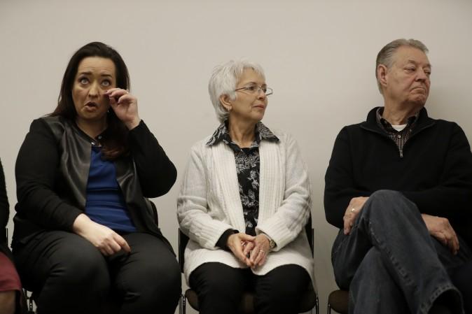 (L-R) Sister Angela mother Sandra, and father Dimmon of U.S. tourist Melissa Cochran, who was injured and whose husband, Kurt Cochran, was killed in Wednesday's London attack, during a press conference with family members at New Scotland Yard, the headquarters of the Metropolitan Police force, in London on March 27, 2017. (AP Photo/Matt Dunham)
