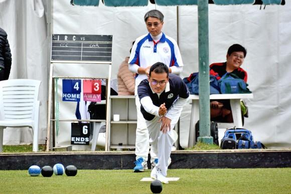 Robin Chok, skip for CCC, bowls with C L Fung, skip for CdeR, in the early stages of one of the semi-finals of the 2017 Men's National Pairs held at IRC on Sunday 26th March. CCC won 15/13 after the 18 ends to set up a finals match against ILBC in July. (Stephanie Worth)