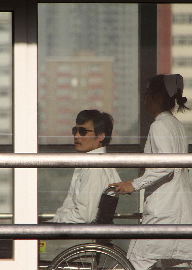 Chinese activist activist Chen Guangcheng (L) at the Chaoyang hospital in Beijing on May 2, 2012. (Jordan Pouille/AFP/GettyImages)