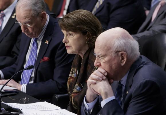 Sen. Dianne Feinstein, D-Calif., the ranking member of the Senate Judiciary Committee, flanked by the Committee's Chairman Sen. Charles Grassley, R-Iowa, left, and Sen. Patrick Leahy, D-Vt., speaks in opposition of the nomination of President Donald Trump's Supreme Court nominee Neil Gorsuch on Capitol Hill in Washington on April 3, 2017. (AP Photo/J. Scott Applewhite)
