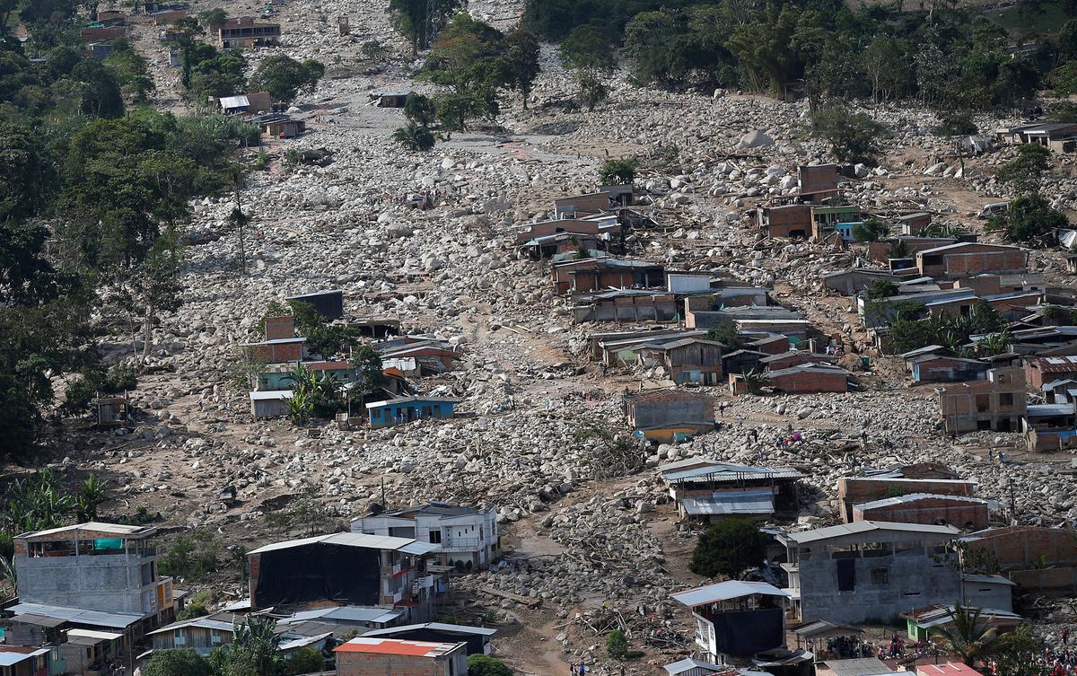 Aerial view of a neighborhood destroyed after flooding and mudslides caused by heavy rains leading several rivers to overflow, pushing sediment and rocks into buildings and roads, in Mocoa, Colombia on April 3, 2017. (REUTERS/Jaime Saldarriaga)