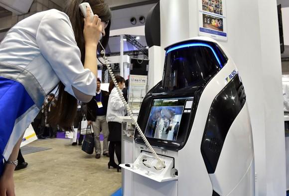 Japan's security company Alsok displays the newly developed security and guide robot "Reborg-X", which guides visitors and shoppers in the day time while it patrols a shopping mall autonomously at the annual Security Show in Tokyo on March 4, 2015. (YOSHIKAZU TSUNO/AFP/Getty Images)