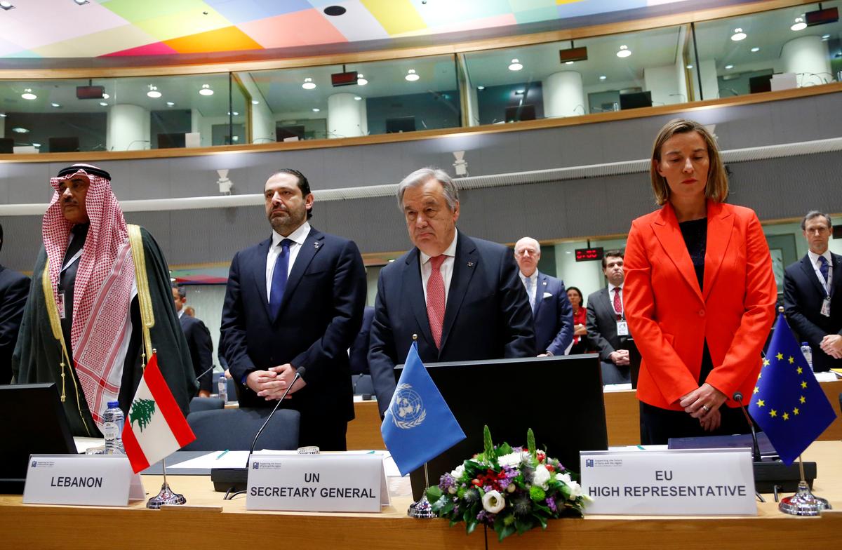 (L-R) Kuwait Foreign Minister Sabah Al Khalid Al Sabah, Lebanese Prime Minister Saad al-Hariri, United Nations Secretary General Antonio Guterres and European Union foreign policy chief Federica Mogherini observe a minute of silence in respect for the victims of suspected Syrian government chemical attack during an international conference on the future of Syria and the region, in Brussels, Belgium on April 5, 2017. (REUTERS/Francois Lenoir)