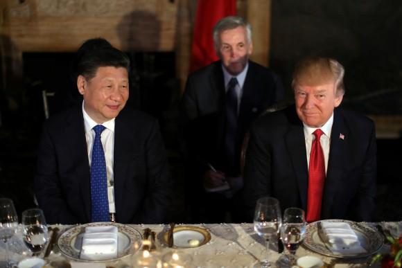 Chinese President Xi Jinping and President Donald Trump attend a dinner at the start of their summit at Trump's Mar-a-Lago estate in West Palm Beach, Florida. (REUTERS/Carlos Barria)