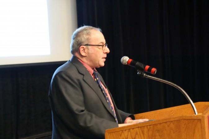 Fred Litwin, president of the Free Thinking Film Society, delivered the welcome remarks at the "Human Harvest" film screening at the University of Ottawa on April 6, 2017. (Jonathan Ren/Epoch Times)