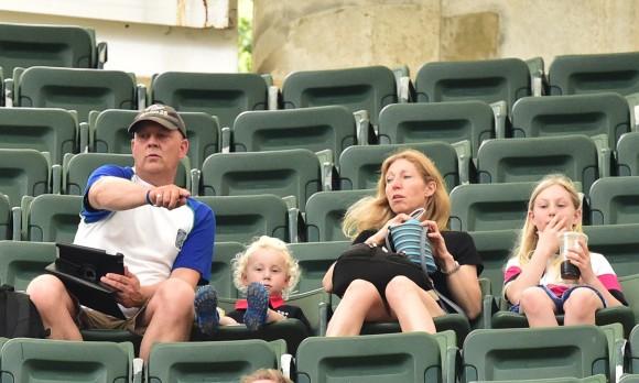 Sitting high in the East Stand, well away from the crowds, even the youngsters are interested in the Hong Kong Sevens action. Youngsters under the age of 3 years gain free entry to the Sevens. (Bill Cox/Epoch Times)