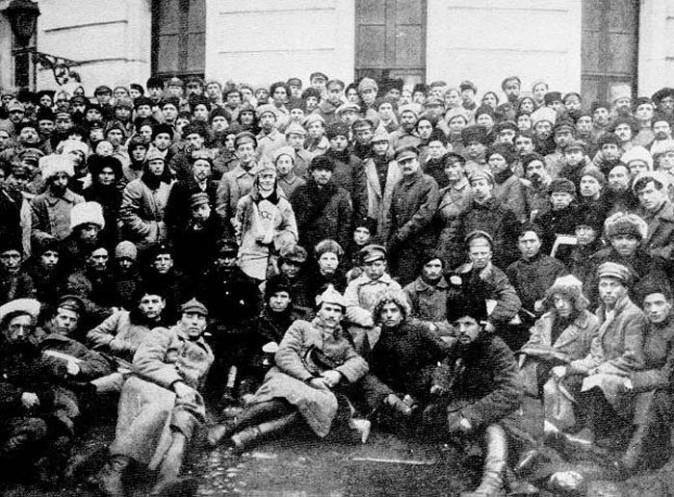 Lenin (center, with dark fur hat and coat) and other communist leaders with Red Army soldiers who participated in crushing the anti-Bolshevik Kronshtadt uprising. (Leon Leonidov)