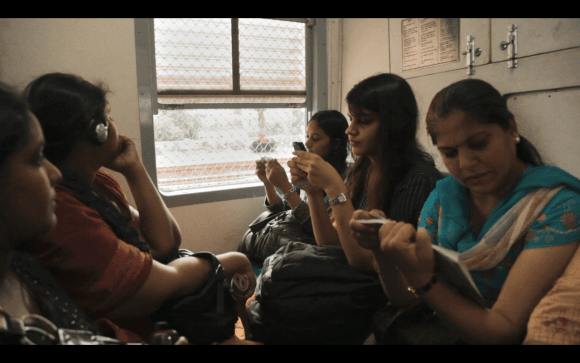 Ritu (C, right) on a train in the documentary "A Suitable Girl."