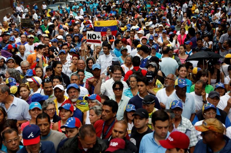Demonstrators rally against Venezuela's President Nicolas Maduro in Caracas, Venezuela on April 13, 2017. (REUTERS/Carlos Garcia Rawlins)