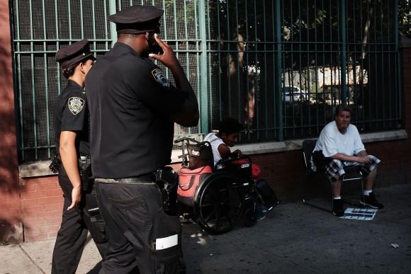 Police patrol an area which has witnessed an explosion in the use of K2 or 'Spice', a synthetic marijuana drug, in East Harlem in New York City on Sept. 16, 2015. (Spencer Platt/Getty Images)