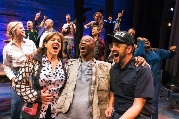 (L–R) Sharon Wheatley, Rodney Hicks, Geno Carr (front), and cast, in a scene from "Come From Away." (Matthew Murphy)