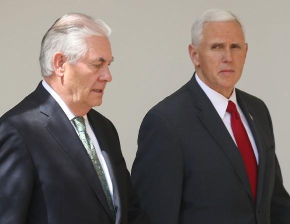 Vice President Mike Pence (R) and Secretary of State Rex Tillerson walk away from a news conference with President Donald Trump in the Rose Garden at the White House in Washington on April 5, 2017. (Mark Wilson/Getty Images)