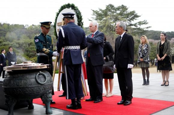 U.S. Vice President Mike Pence visits the National Cemetery in Seoul, South Korea, April 16, 2017. (REUTERS/Kim Hong-Ji)
