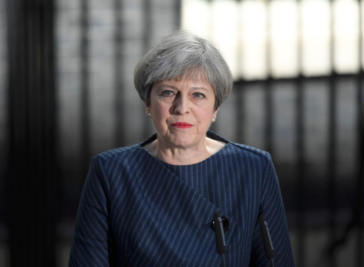 Britain's Prime Minister Theresa May speaks to the media outside 10 Downing Street, in central London, Britain on April 18, 2017. (REUTERS/Toby Melville)