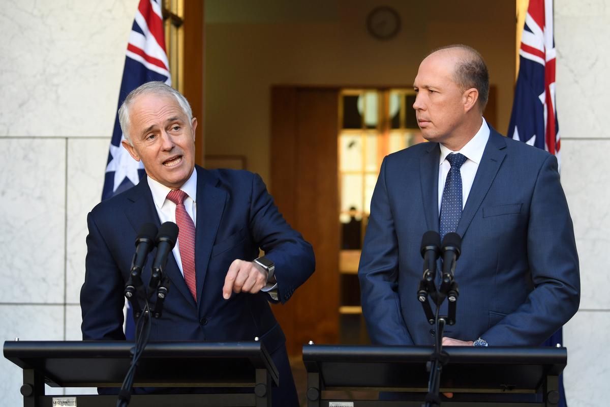 Australia's Prime Minister Malcolm Turnbull (L) and Minister for Immigration and Border Protection Peter Dutton speak on Australia's citizenship test during a press conference at Parliament House in Canberra, Australia on April 20, 2017. (AAP/Lukas Coch/via REUTERS)