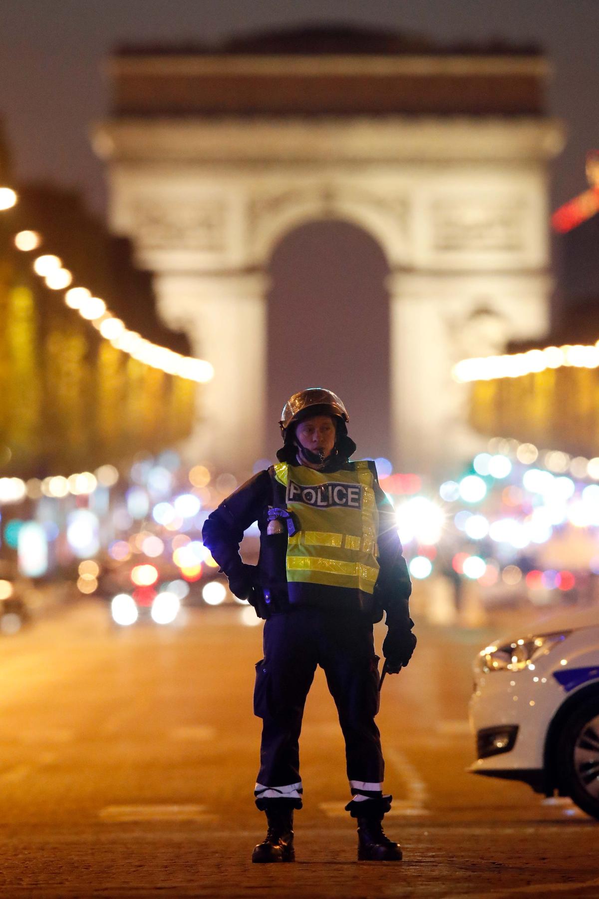 Police secure the Champs Elysees Avenue in Paris, France on April 20, 2017. (REUTERS/Christian Hartmann)