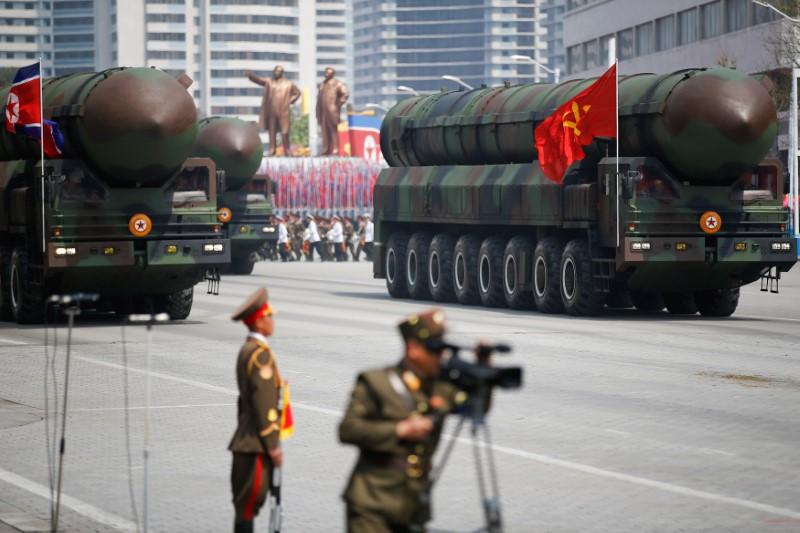 Intercontinental ballistic missiles (ICBM) are driven past the stand with North Korean leader Kim Jong Un and other high ranking officials during a military parade marking the 105th birth anniversary of country's founding father Kim Il Sung, in Pyongyang on April 15, 2017. (REUTERS/Damir Sagolj)