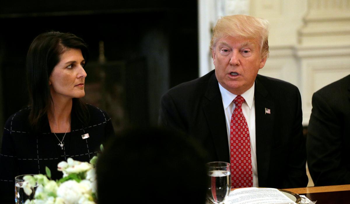 With U.S. Ambassador to the United Nations Nikki Haley at his side (L) President Donald Trump speaks during a working lunch with ambassadors of countries on the UN Security Council at the White House in Washington on April 24, 2017. (REUTERS/Kevin Lamarque)