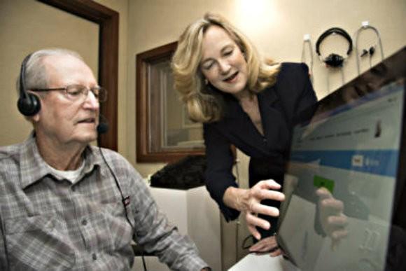 Tye-Murray helps Lonnie Willmann record audio clips for his wife, Kathleen Willmann, who has been diagnosed with hearing loss. (Credit: Robert Boston/Washington University in St. Louis School of Medicine)